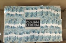 Polícia apreende 112 notas falsas de R$ 100 em encomenda enviada pelo correio, em Apucarana